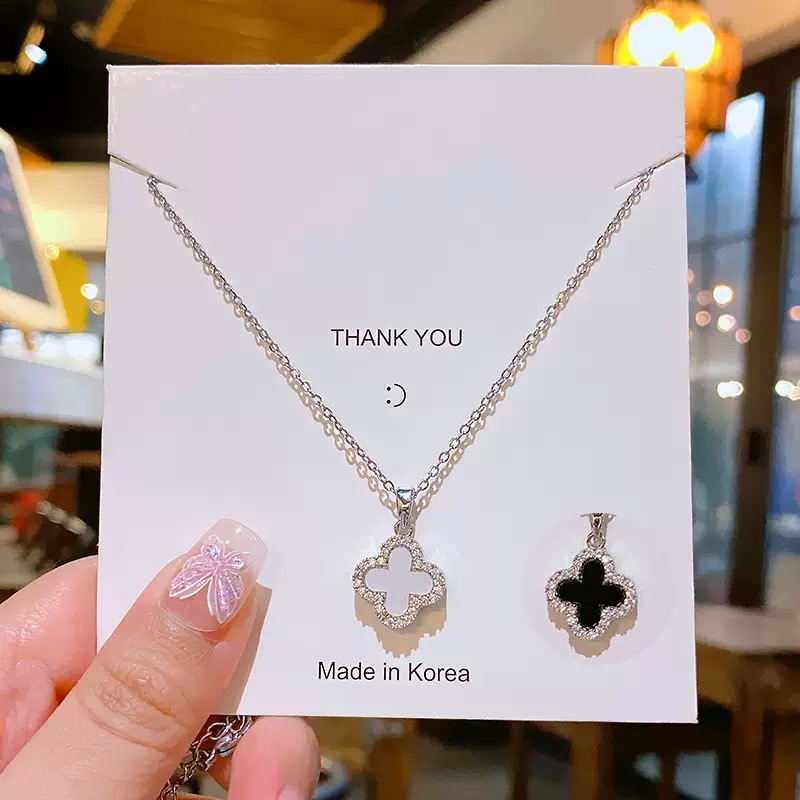 N-TTN009 ສາຍຄໍ Ivory Noir Clover